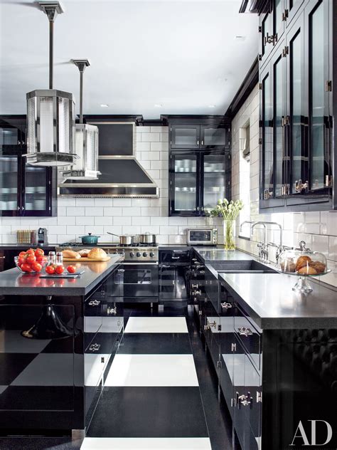 black kitchen with white cabinets